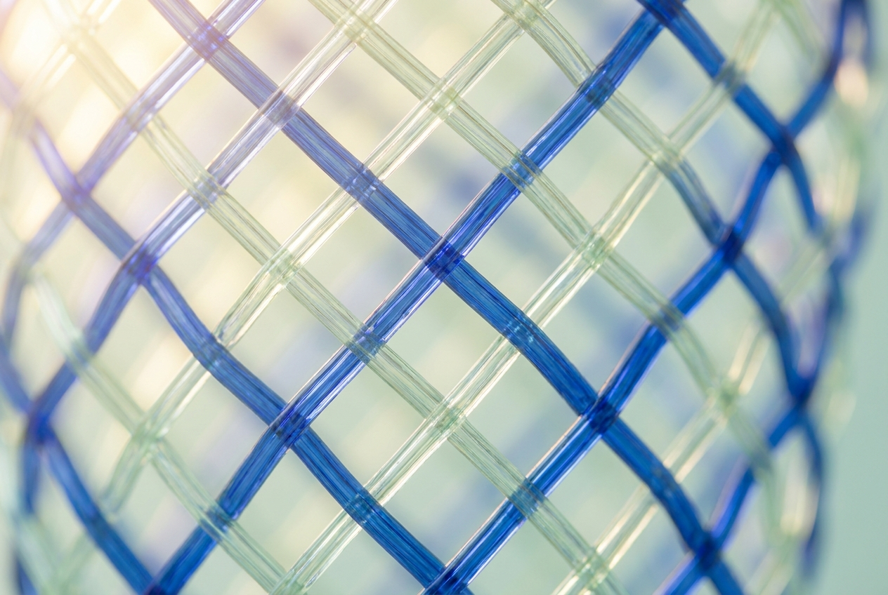 Macro detail of woven ultramarine and celadon glass threads